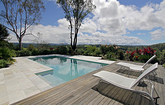 Outdoor decking area with view of bushland
