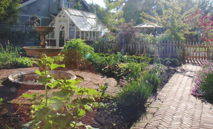 English Vegetable Garden With A Vintage Greenhouse