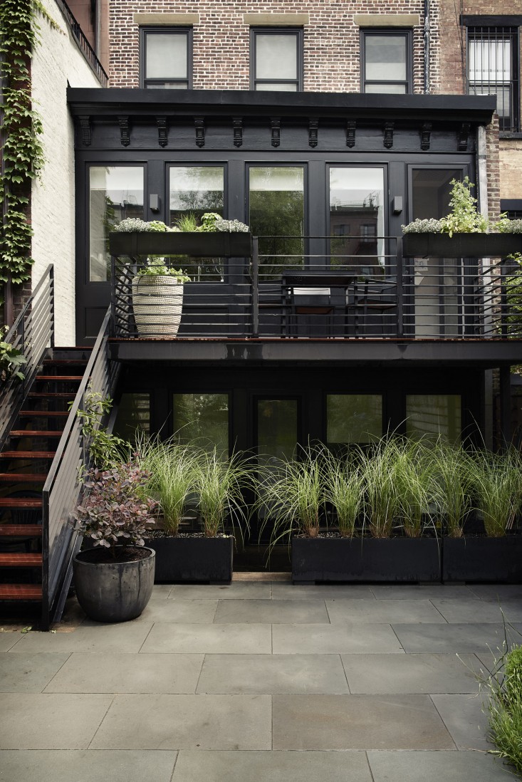 Modern Townhouse Garden With Dining And Lounging Spaces