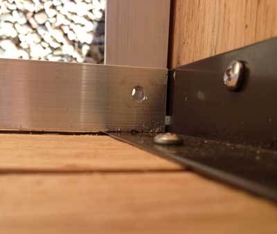 predrilled screw holes in corner braces of Elevated Cedar Planter Box