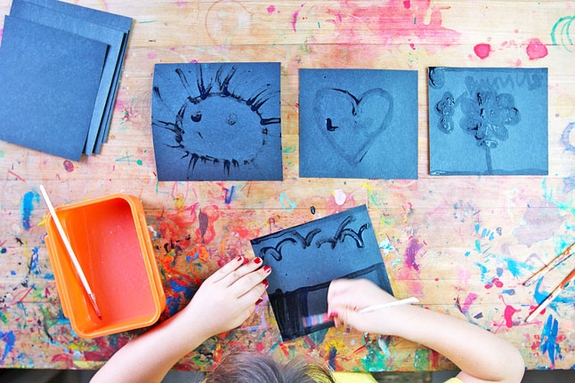 Use a laundry detergent as paint to create hidden pictures that are revealed in the dark.