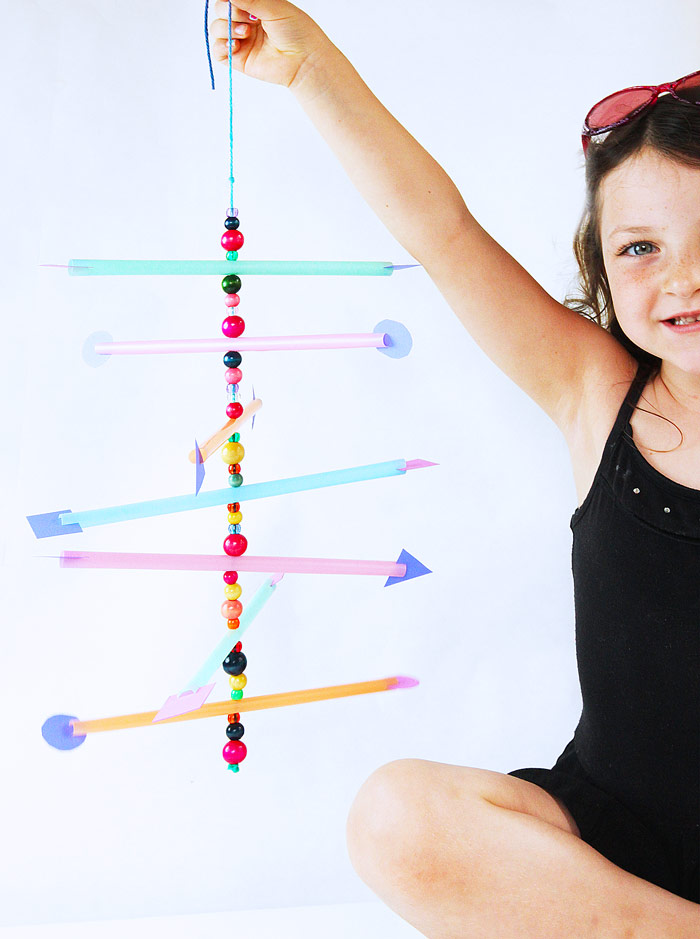 Make a simple mobile from straws and explore the concept of the center of gravity.