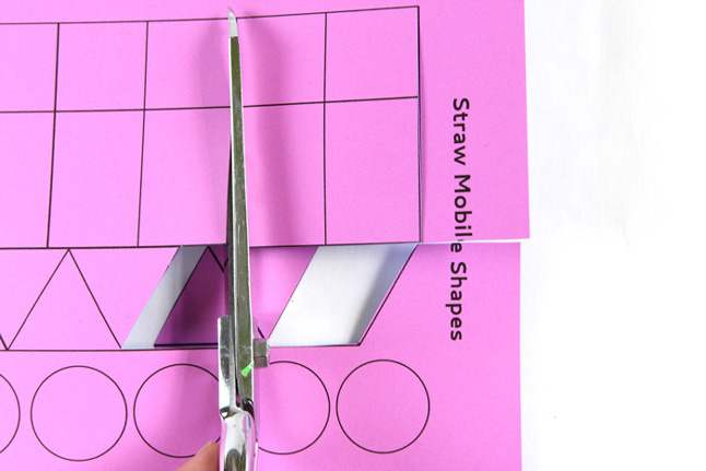 Make a simple mobile from straws and explore the concept of the center of gravity.