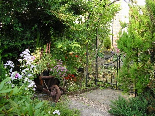 beautiful cottage gardens ideas metal garden gate wheelbarrow