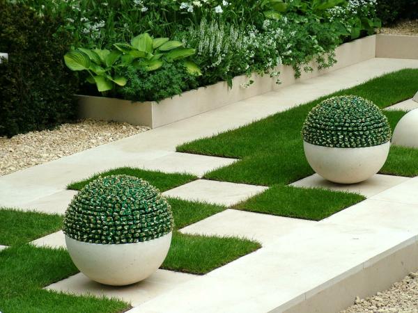 beautiful garden design concrete tiles and grass grid design potted plants