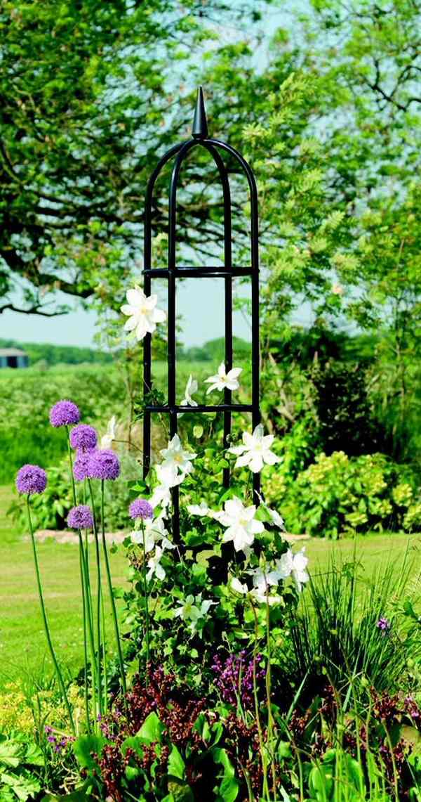 classic metal garden obelisk vertical gardening ideas small garden ideas