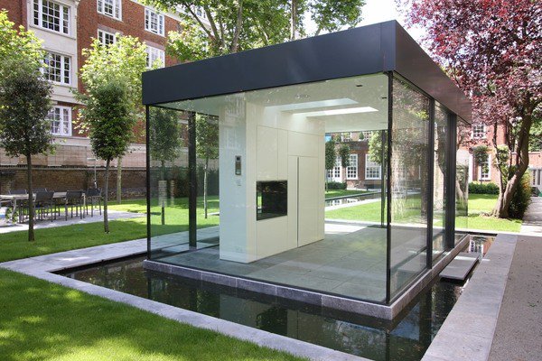 garden room minimalist design glass walls