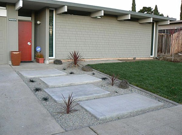 modern landcape design concrete path garden rocks gravel