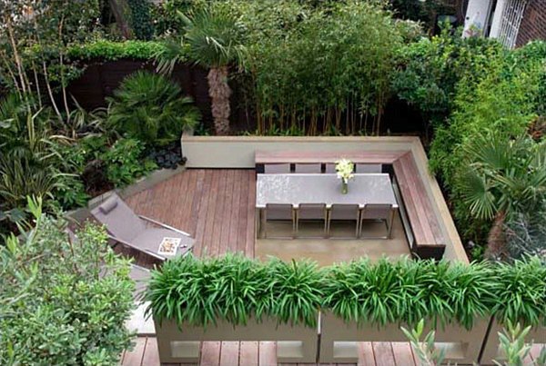 modern-landscape-design-privacy-fence-wooden-deck-outdoor-dining-area-exotic-plants