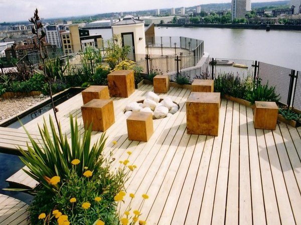 rooftop garden design ideas wooden stools firepit 
