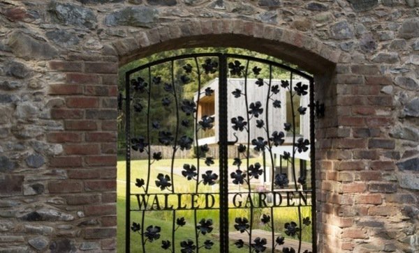 walled garden design ideas wrought iron garden gate 