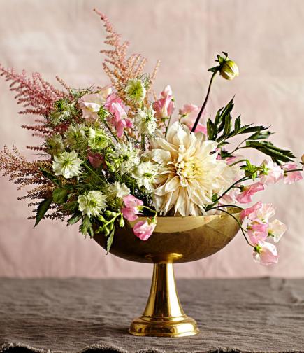 Lushly layered flower arrangement