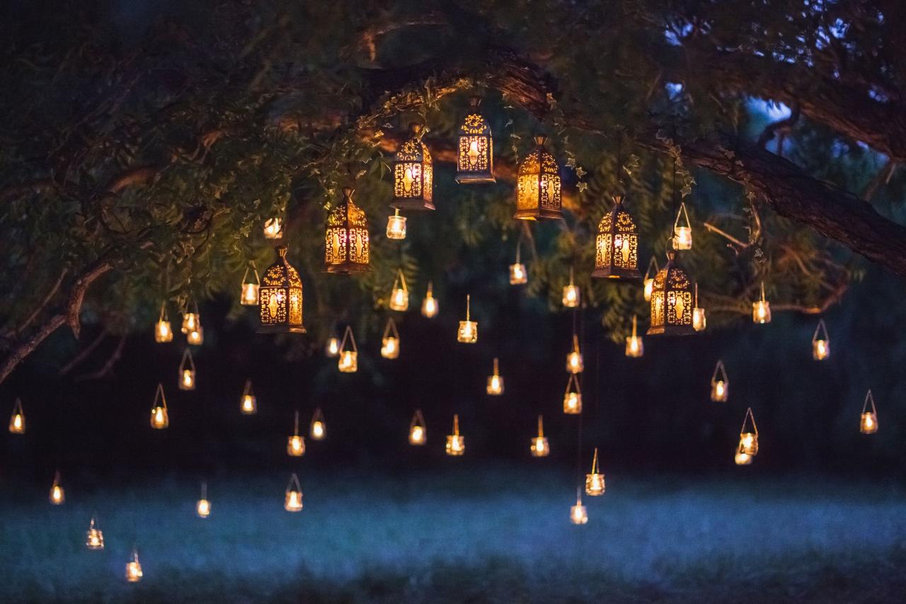 Lights and lanterns in evening garden setting